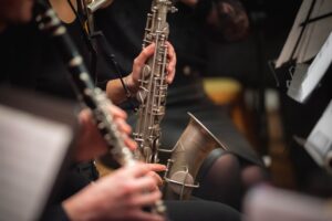 Closeup of a musician playing a saxophone